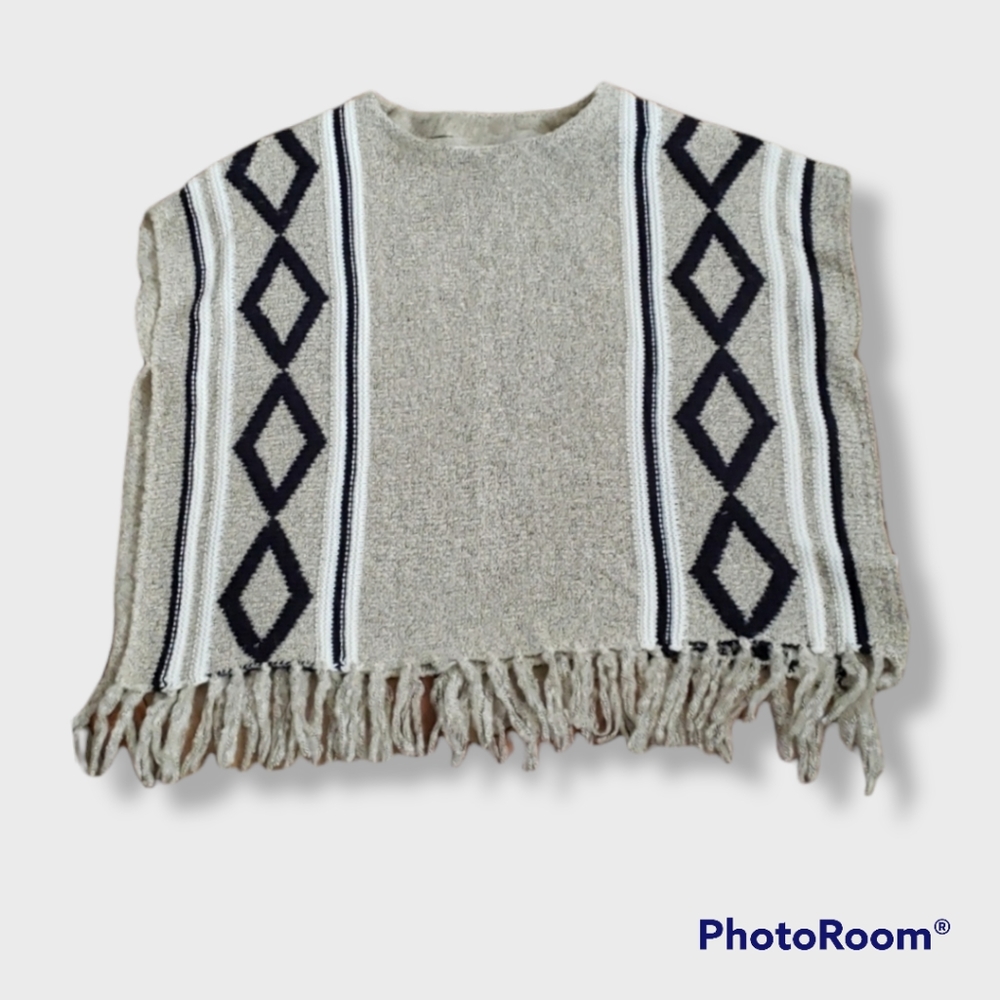 Girl's poncho style fringe sweater